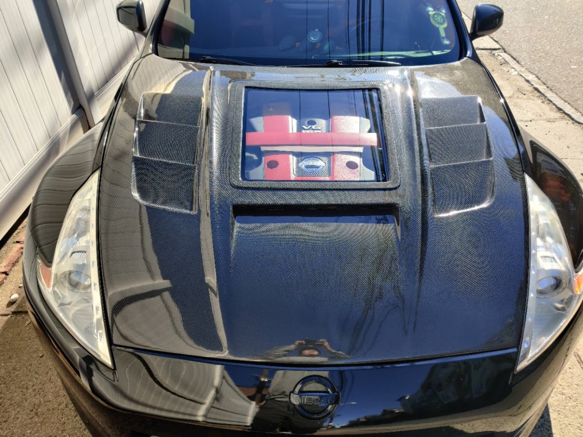 Nissan 370Z Nismo Sport Touring Base Fairlady Z Z34 2009-2020 with Aftermarket Parts - V1 Glass Clearview Style Hood Bonnet Carbon Fiber / FRP from CMST Tuning
